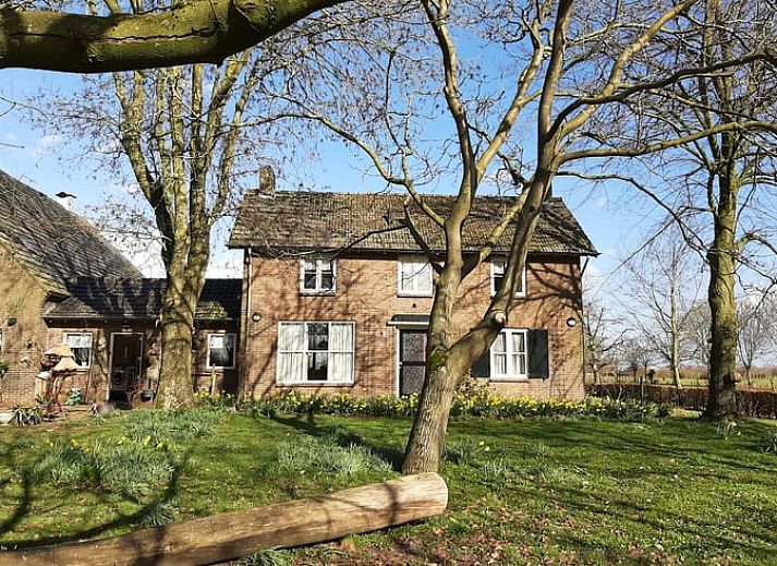 Uitzicht vanuit Vakantiehuisje in Keent, Noordoost Brabant, met groene natuur en serene omgeving.