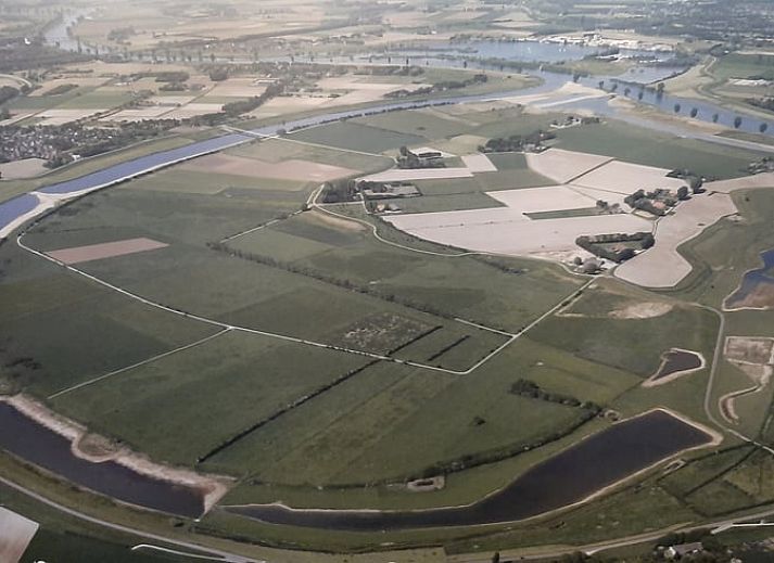 Uitzicht vanuit Vakantiehuisje in Keent, Noordoost Brabant, met groene natuur en serene omgeving.
