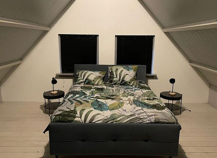 Houtopslag en vuurplaats bij Vakantiehuis in Breda, West Brabant.