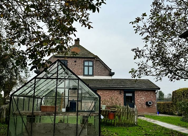 Vakantiehuisje in Ossendrecht met serre en tuin in West Brabant.