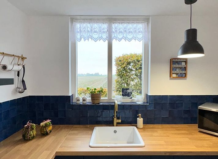 Vakantiehuisje in Ossendrecht met serre en tuin in West Brabant.