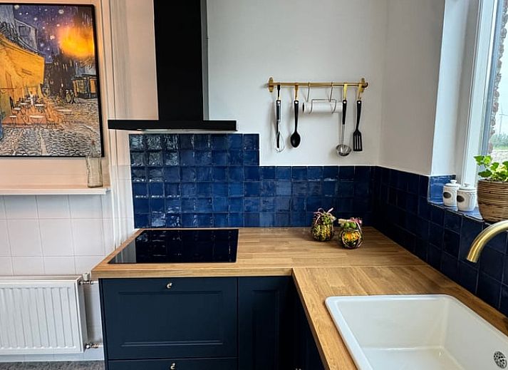 Sierlijke kroonluchter in Vakantiehuisje in Ossendrecht, Noord Brabant.