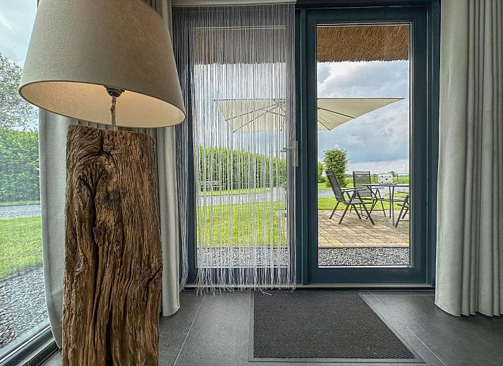 Rear view of Villa Bianco in Alphen, West Brabant with green surroundings.