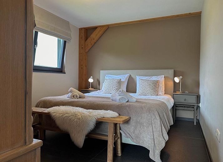 Modern living room of Villa Bianco vacation home in Alphen, North Brabant.