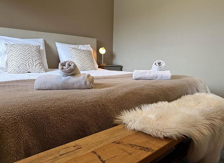 Modern living room of Villa Bianco vacation home in Alphen, North Brabant.