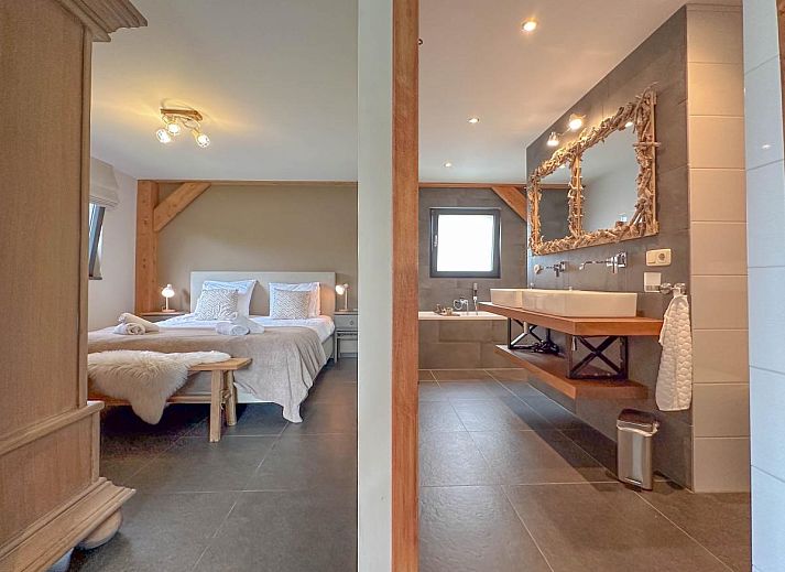 Modern living room of Villa Bianco vacation home in Alphen, North Brabant.