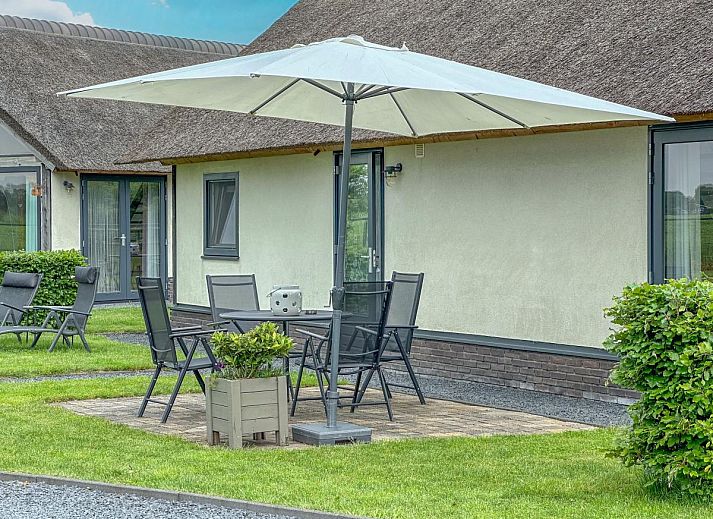 Cozy dining area in Villa Bianco vacation home, Alphen, West Brabant.
