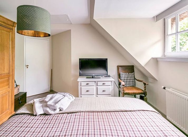 Ruime open keuken en eetkamer in vakantiehuis in Roosendaal, West Brabant.