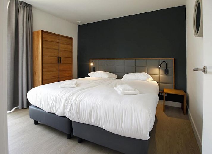 Vakantiehuis Albatros in Oosterhout, Noord Brabant, omgeven door weelderige natuur en uitgestrekte velden, ideaal voor een ontspannen verblijf.