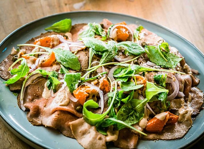 Dining table in cottage in Oosterhout, vacation home in Oosterhout, West Brabant, North Brabant.
