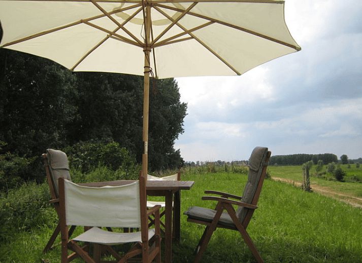 Cozy dining area in Holiday home in Drimmelen, North Brabant with wooden interior.