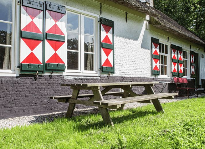 Cozy dining area in Holiday home in Drimmelen, North Brabant with wooden interior.