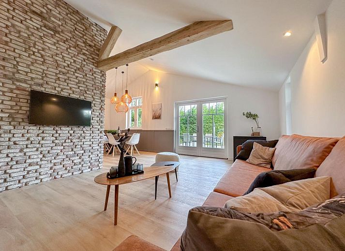 Relax in the hot tub of De Stal vacation home in Rijsbergen, West Brabant surrounded by green surroundings.