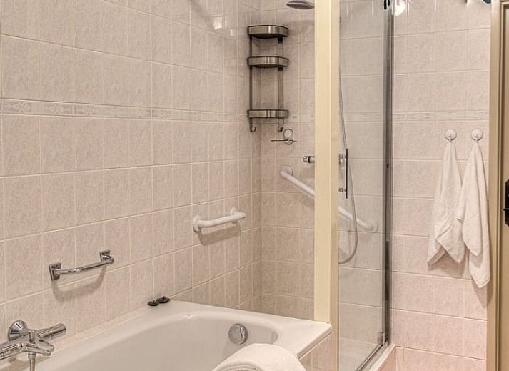 Schattige Veranda von Huisje in Sprundel, einem Ferienhaus im gruenen Westbrabant.