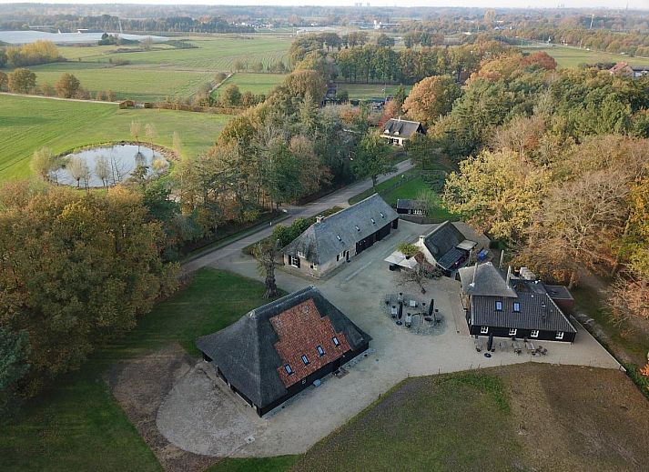Aerial view of Jager en Hooijmijt, a vacation home in Ulvenhout AC, North Brabant, surrounded by nature and sweeping views.
