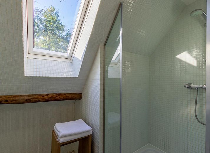 Enjoy the spacious interior of the Jager en Hooijmijt vacation home in Ulvenhout AC, West Brabant, with views of the natural surroundings.