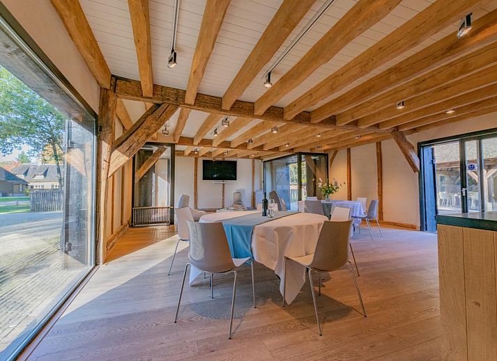 Thatched facade of De Jager en de Gelagkamers, a vacation home in Ulvenhout AC, North Brabant.