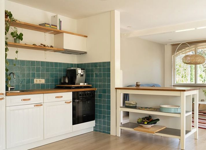 Stylish living room in Holiday Home in Ulvenhout AC, West Brabant, with modern furnishings.