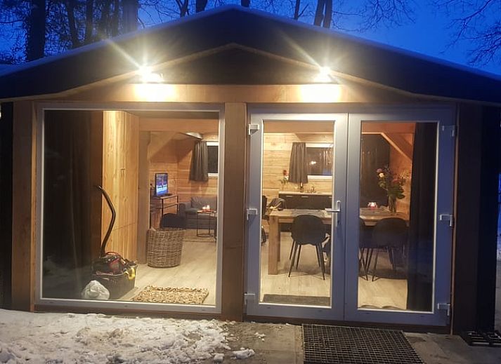 Terrace of Cottage in Schijf, vacation home in North Brabant with comfortable seating.