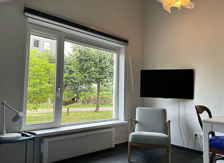 Rustiek terras bij Vakantiehuis in Herpt, West Brabant, perfect voor ontspanning in Noord Brabant.