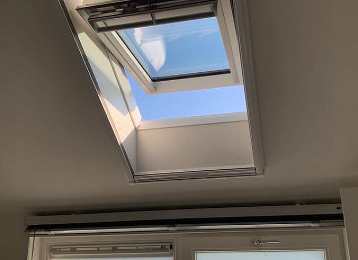 Charmante zijtuin van Vakantiehuis in Herpt, omringd door groen in West Brabant, Noord Brabant.