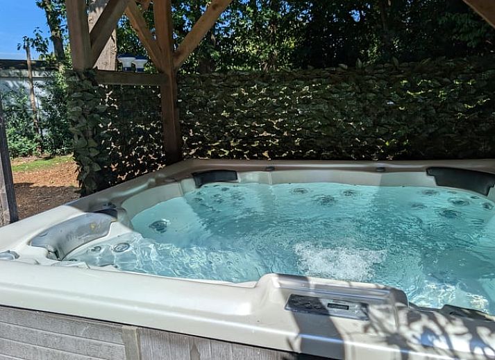 Moderne binnenruimte van Vakantiehuis in Heerle met comfortabele zithoek.