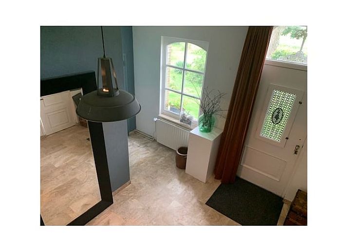 Charmant Huisje in Moerstraten, West Brabant met rieten dak en zonnige tuin, perfect vakantiehuis in de natuur van Noord Brabant.