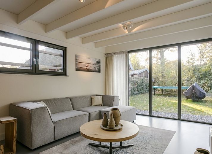 8 pers villa met sauna in Schoorl, Noord-Holland, met moderne architectuur en ruime tuin aan de Noordzeekust.