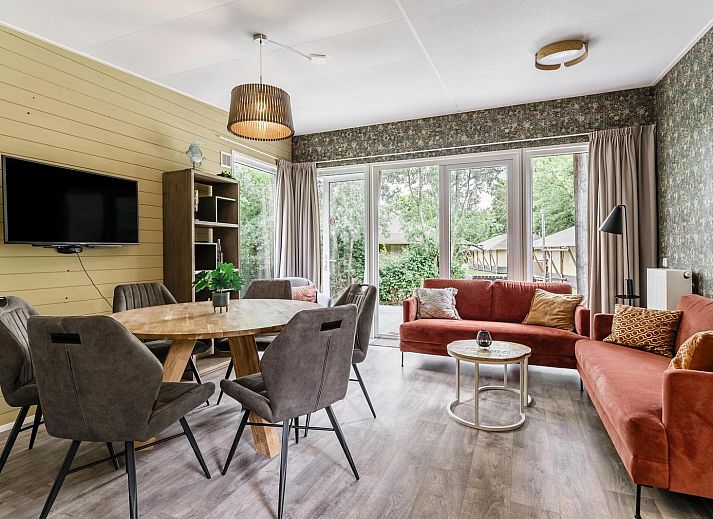 Beach cottage 6 people in Julianadorp, North Sea coast. Vacation home with modern veranda and green surroundings in North Holland.