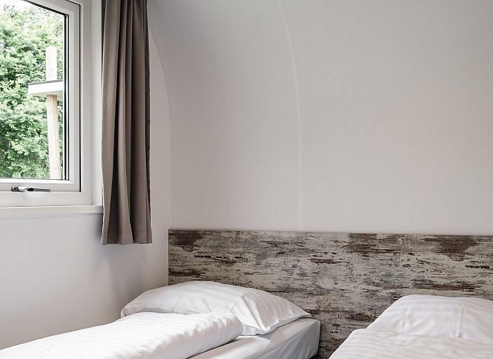 Cozy living room of Beach House sleeps 6 in Julianadorp, North Sea coast. Vacation home offers comfort and views of the nature of North Holland.