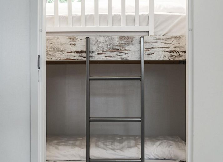 Cozy living room of Beach House sleeps 6 in Julianadorp, North Sea coast. Vacation home offers comfort and views of the nature of North Holland.