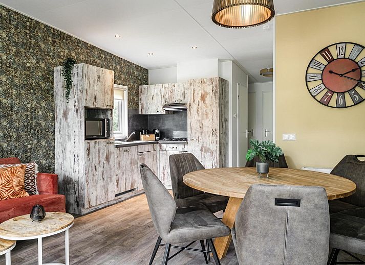 Cozy living room of Beach House sleeps 6 in Julianadorp, North Sea coast. Vacation home offers comfort and views of the nature of North Holland.