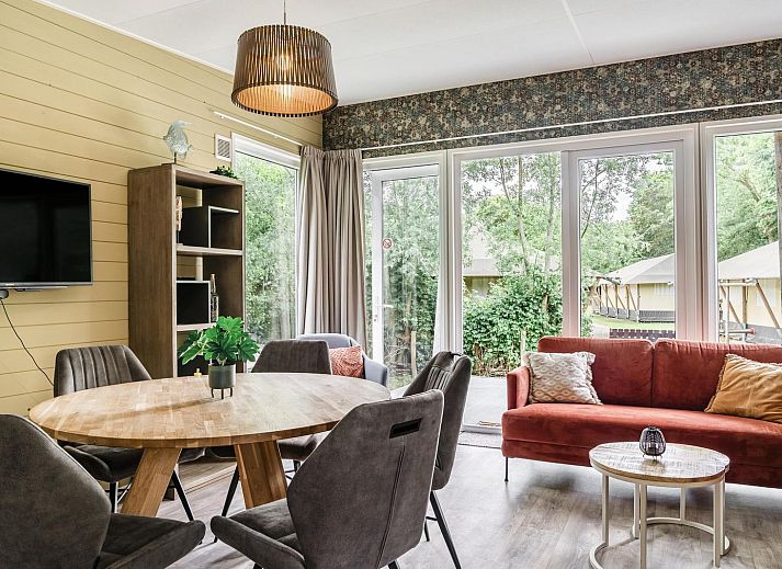 Cozy interior of Beach House sleeps 6 in Julianadorp, North Sea Coast, with modern kitchen and comfortable seating area.