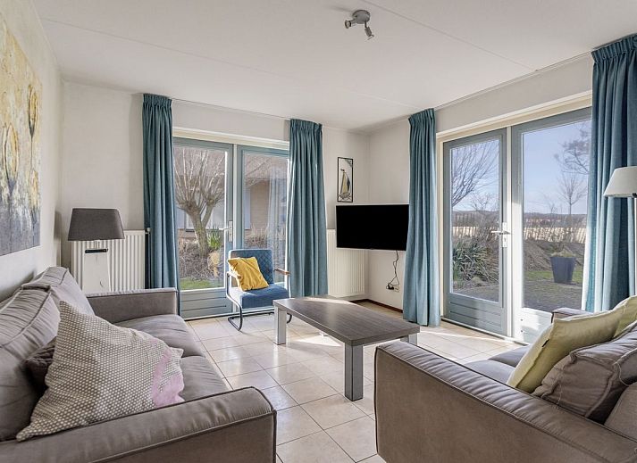 Vrijstaande woning in Julianadorp, een charmant vakantiehuis aan de Noordzeekust in Noord-Holland, omgeven door groene natuur en rust.