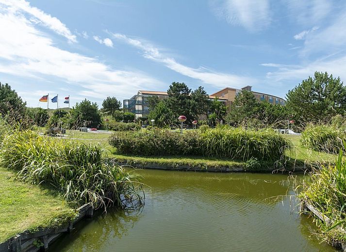 Gemuetliches Wohnzimmer des Strandslag 225 Julianadorp aan zee mit komfortabler Sitzecke in Nordholland.