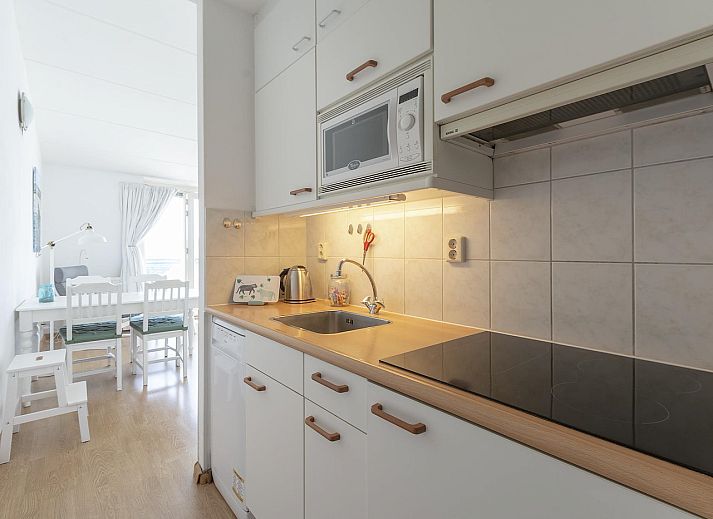 Aussenansicht des Strandslag 225 Julianadorp aan zee mit Blick auf das Gebiet an der Nordseekueste.