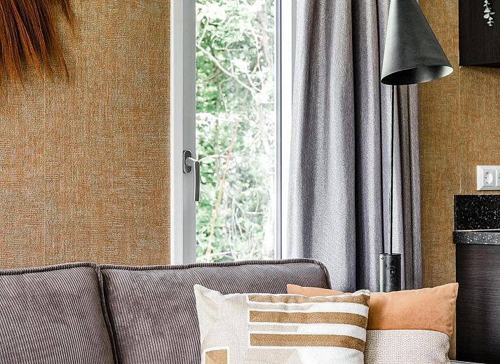 Strandhuisje 4 personen in Julianadorp met moderne veranda aan de Noordzeekust in Noord-Holland.