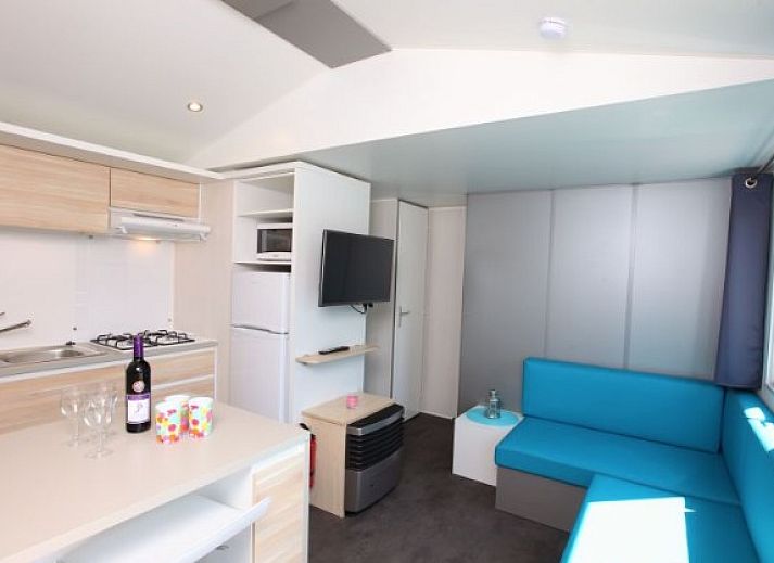 Vrijstaande comfort chalet ECO6 met terras in Egmond aan Zee, Noordzeekust, Noord-Holland, ideaal voor buitenontspanning.