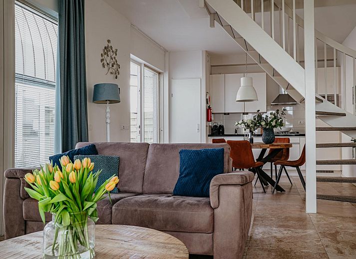 The Platvis vacation home in Egmond aan Zee features modern architecture and a sunny terrace on the North Sea coast of North Holland.