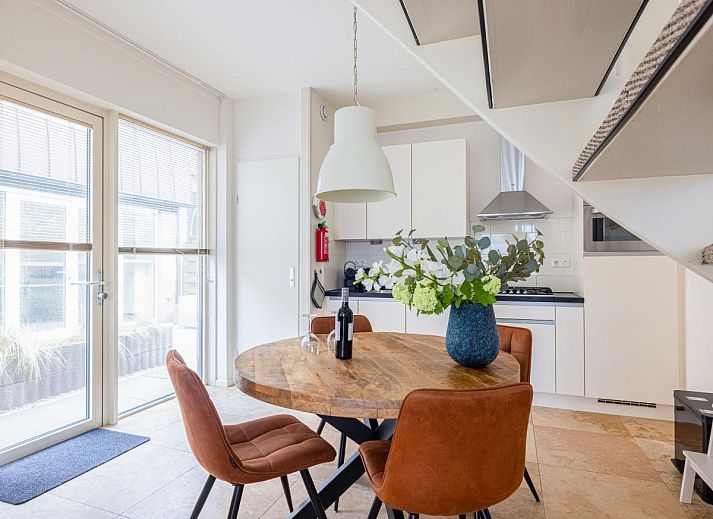 The Platvis vacation home in Egmond aan Zee features modern architecture and a sunny terrace on the North Sea coast of North Holland.