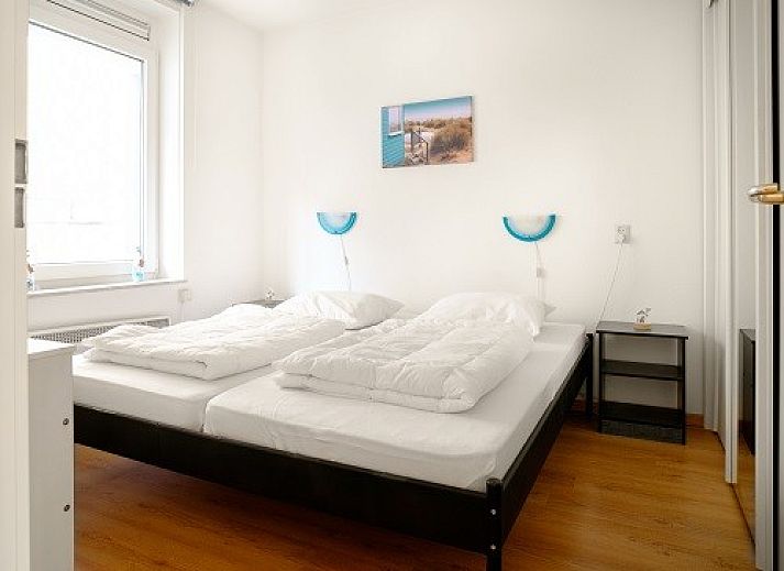 Zonsondergang op het strand bij Bad8 appartement in Callantsoog, Noordzeekust, Noord-Holland.