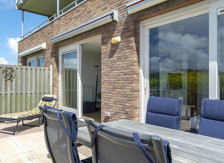 Cozy terrace with view at Duinerei C002 Groote Keeten vacation home in Callantsoog, North Sea coast, North Holland.