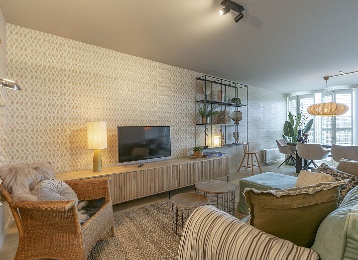 Cozy living room of vacation home Strandleven 006 Groote Keeten in Callantsoog, North Holland.