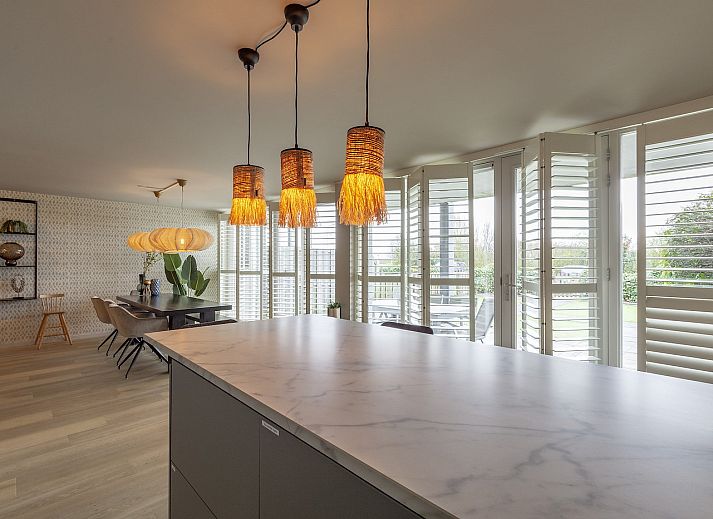 Cozy living room of vacation home Strandleven 006 Groote Keeten in Callantsoog, North Holland.