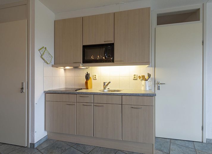 Uitzicht op de omgeving van Wijde Blick 206 Callantsoog, vakantiehuis aan de Noordzeekust met uitgestrekte duinen.