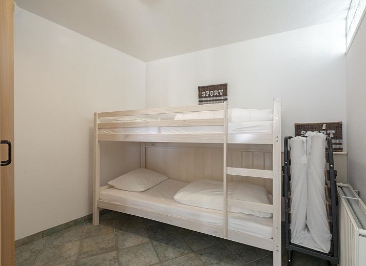 Ruim balkon van vakantiehuis Wijde Blick 206 Callantsoog met uitzicht op de duinen aan de Noordzeekust.