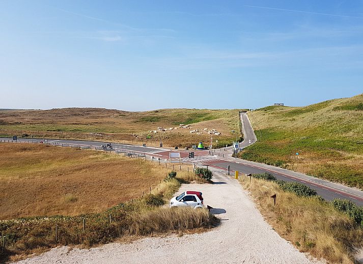 Comfortabele zithoek in Wijde Blick 212 Callantsoog, vakantiehuis aan de Noordzeekust.