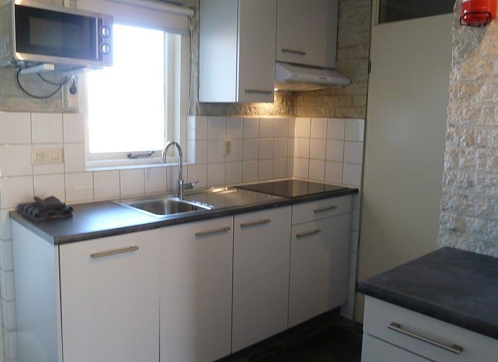 Terrace with deck chairs at Abbestederweg 24b, vacation home in Callantsoog, North Sea coast, North Holland.