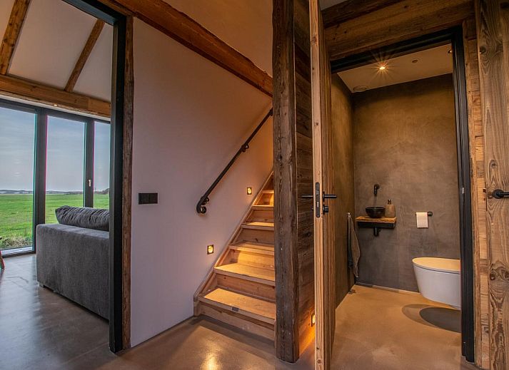 Terrasse des Ferienhauses De Bonte Specht in Callantsoog mit Blick auf die Natur und die Nordseekueste.