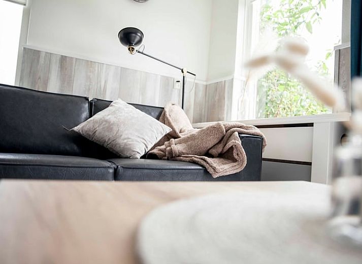 Aussenbereich des Ferienhauses in Callantsoog, Nordseekueste, Nordholland, umgeben von Duenengras.